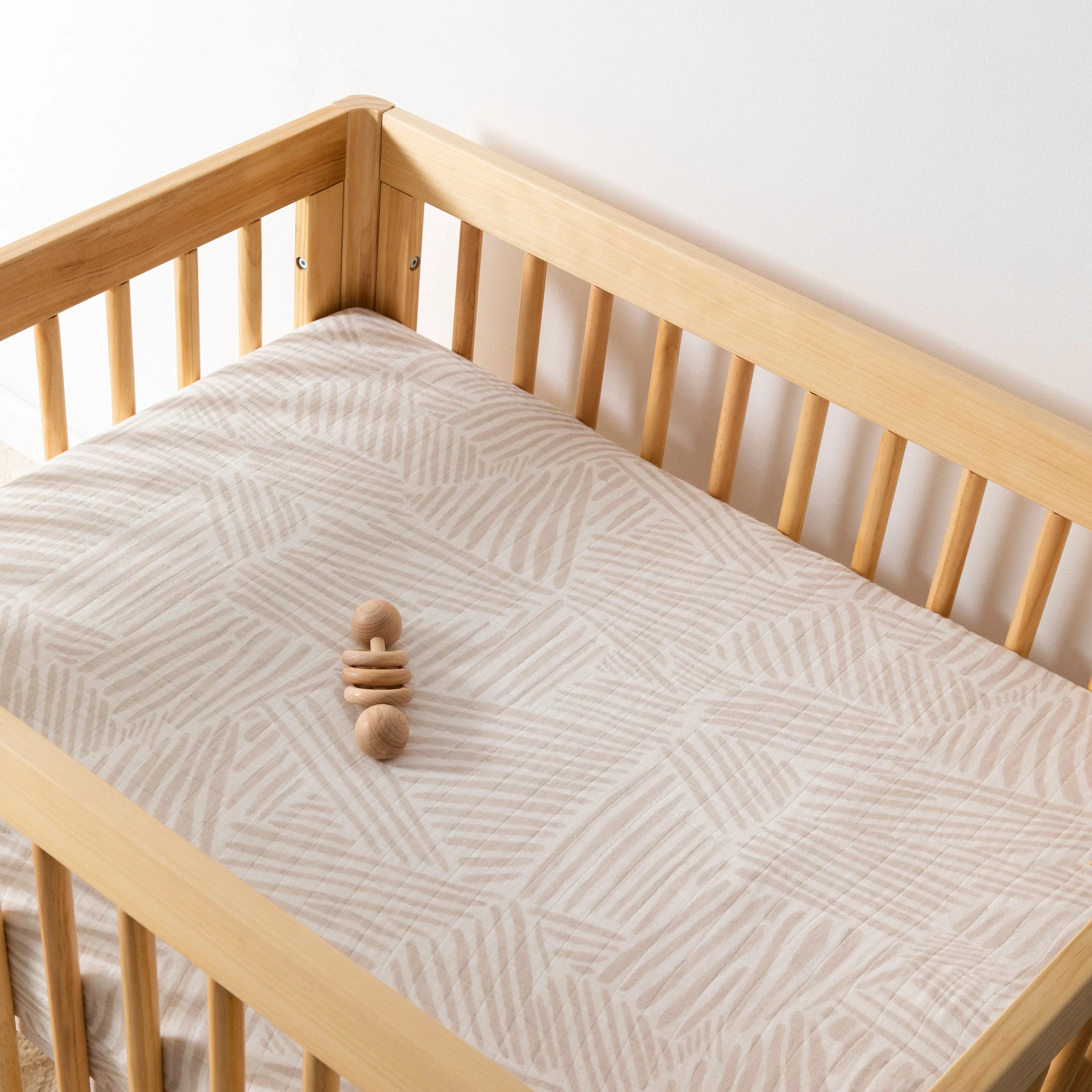 All-Stages Midi Crib Sheet in Oat Stripe by Babyletto